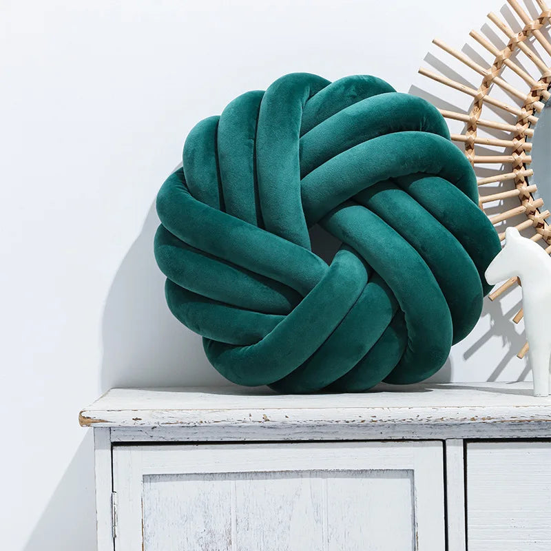 Coussin nœud rond décoratif