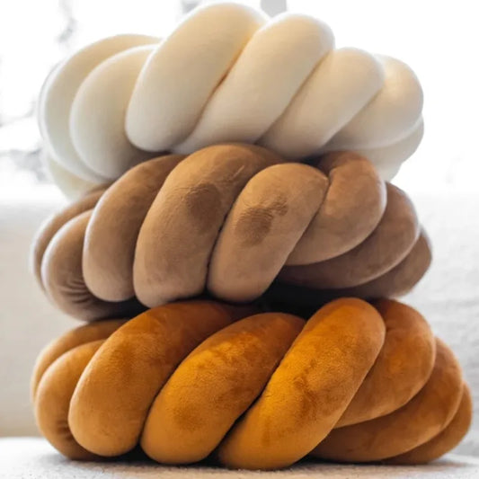Coussin nœud rond décoratif