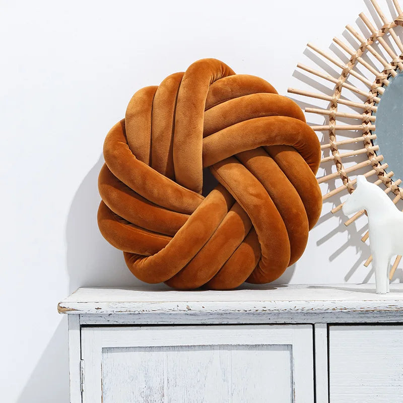 Coussin nœud rond décoratif