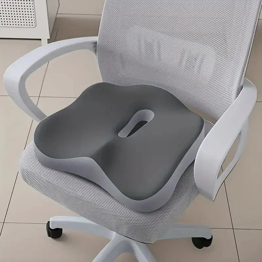 Coussin d'assise à rainure centrale