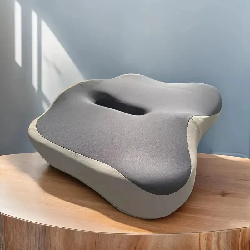 Coussin d'assise à rainure centrale