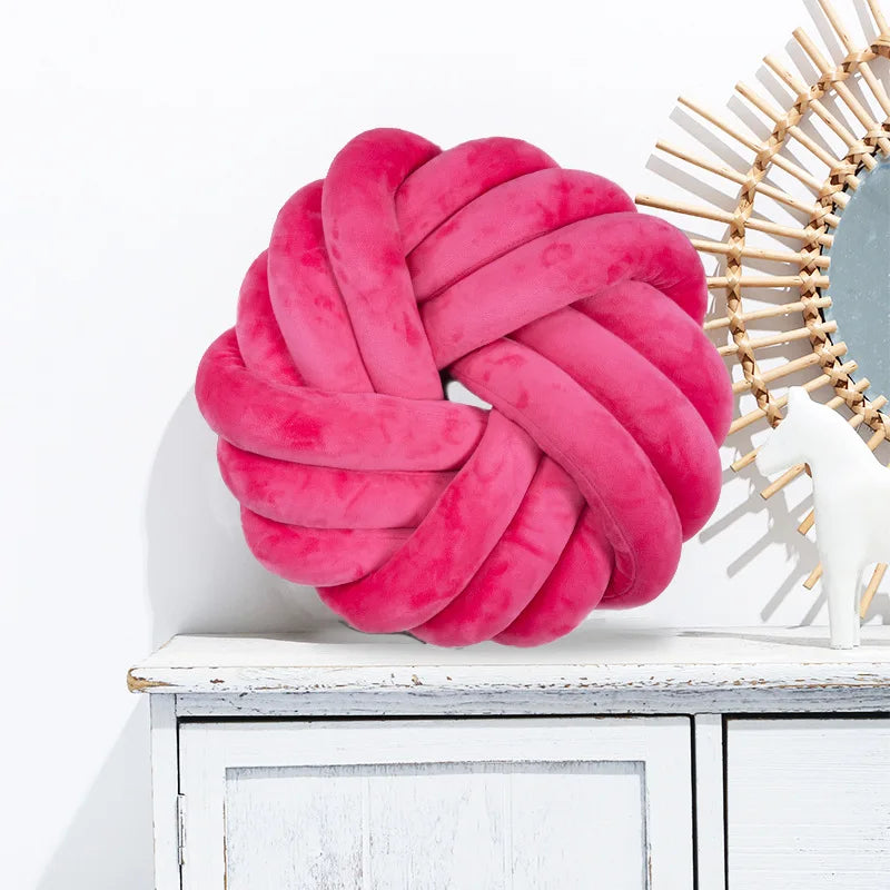 Coussin nœud rond décoratif