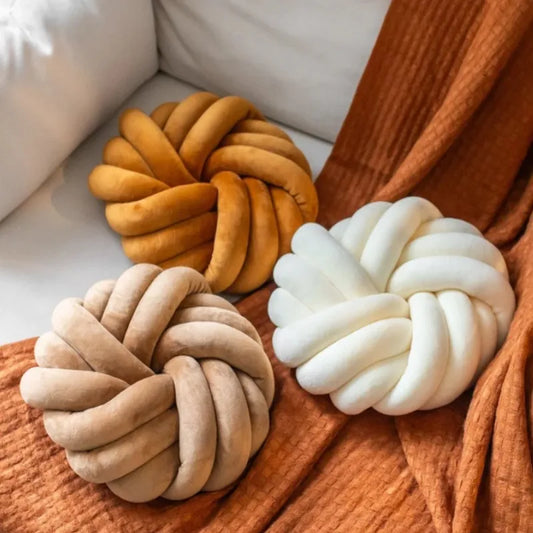 Coussin nœud rond décoratif